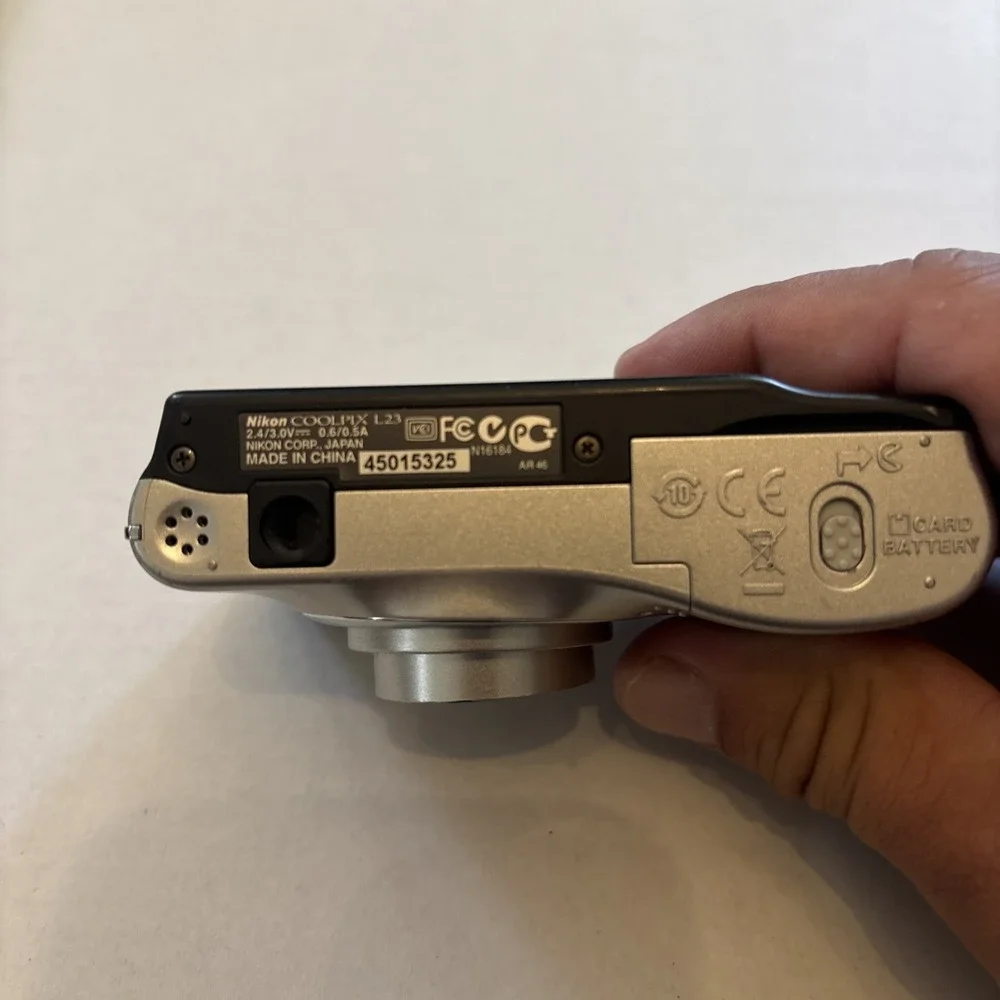 Nikon CoolPix L23‎ 10.1MP Silver Digital Camera - Parts Only